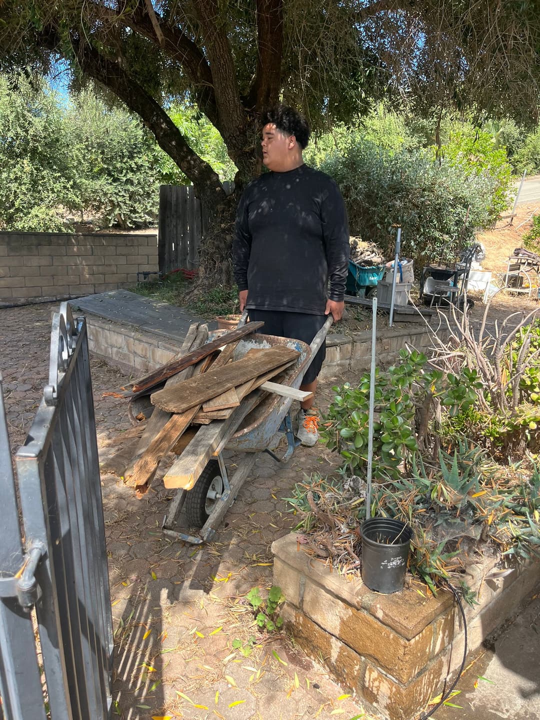 wooden junk being removed by M Junk Removal